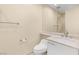 Bright bathroom with a toilet and vanity featuring a modern mirror and sleek fixtures at 2747 Paradise Rd # 2704, Las Vegas, NV 89109