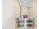 Sleek bathroom features modern metal shelving and a full mirror, enhancing the sense of space at 2747 Paradise Rd # 2704, Las Vegas, NV 89109