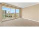 Cozy bedroom featuring a sliding glass door with city views, offering a relaxing retreat at 2747 Paradise Rd # 2704, Las Vegas, NV 89109