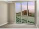 Bedroom featuring carpet, neutral paint, and large windows showcasing city views at 2747 Paradise Rd # 2704, Las Vegas, NV 89109