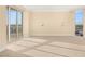 Bright bedroom with neutral carpet, recessed lighting and expansive windows, offering city views at 2747 Paradise Rd # 2704, Las Vegas, NV 89109
