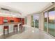 Gourmet kitchen features custom cabinets, granite counters, city views, and breakfast bar at 2747 Paradise Rd # 2704, Las Vegas, NV 89109