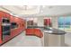 Gourmet kitchen with custom cabinets, granite counters, stainless appliances and a city view at 2747 Paradise Rd # 2704, Las Vegas, NV 89109