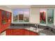 Granite counter tops and stainless sink in a contemporary kitchen with city views at 2747 Paradise Rd # 2704, Las Vegas, NV 89109