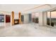 Open-concept living area with fireplace, marble flooring, recessed lighting, and amazing views at 2747 Paradise Rd # 2704, Las Vegas, NV 89109