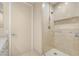 Modern glass enclosed shower featuring a rainfall shower head and convenient built in niche at 2747 Paradise Rd # 2704, Las Vegas, NV 89109