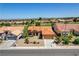 Aerial view of a single-story home with a well-kept front yard and a two-car garage at 3120 Darby Falls Dr, Las Vegas, NV 89134