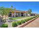 A covered patio and artificial turf highlight this backyard, perfect for entertaining or relaxing at 3120 Darby Falls Dr, Las Vegas, NV 89134