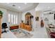 Well-lit home office with shutters on windows, a comfortable workspace, and ample storage at 3120 Darby Falls Dr, Las Vegas, NV 89134