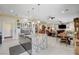 Open kitchen featuring an island with bar seating, stainless steel appliances, and a view of the living area at 3120 Darby Falls Dr, Las Vegas, NV 89134