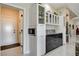 Modern kitchen featuring granite countertops, stainless steel appliances, and abundant storage at 3120 Darby Falls Dr, Las Vegas, NV 89134