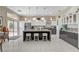 Bright, open kitchen with a large island, modern appliances, and sleek cabinetry at 3120 Darby Falls Dr, Las Vegas, NV 89134