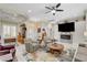 Comfortable living room with a fireplace, stylish decor, and a cozy seating arrangement at 3120 Darby Falls Dr, Las Vegas, NV 89134