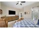 Cozy main bedroom featuring a large dresser and access to the en-suite bathroom at 3120 Darby Falls Dr, Las Vegas, NV 89134
