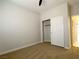 Comfortable bedroom features neutral carpet, closet, and natural light, creating a relaxing atmosphere at 33 Hatten Bay St, Henderson, NV 89012