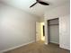Neutral bedroom with fan, closet, and doorway leading into home at 33 Hatten Bay St, Henderson, NV 89012