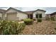 Charming single-story home featuring a xeriscaped front yard and a two-car garage at 33 Hatten Bay St, Henderson, NV 89012