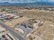 An aerial shot featuring a desert property in a quiet neighborhood at 3301 Underbrush Ave, Pahrump, NV 89048
