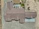 Stunning aerial view of the house with a tile roof and spacious patio area at 3301 Underbrush Ave, Pahrump, NV 89048