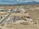This is a desert home, as viewed from above, with ample space and beautiful mountain views at 3301 Underbrush Ave, Pahrump, NV 89048