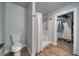 Bathroom featuring a walk-in closet, standing shower, and a comfort height toilet at 3301 Underbrush Ave, Pahrump, NV 89048