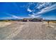 Expansive single-story home featuring a three-car garage and neutral color scheme at 3301 Underbrush Ave, Pahrump, NV 89048