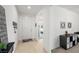 Inviting entryway with neutral tones and tiled flooring, providing a warm welcome into the home at 3568 E Malheur Ave, Pahrump, NV 89061