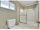Bathroom with a shower-over-tub and a golden frame surrounding the shower at 3746 E Harmon Ave, Las Vegas, NV 89121