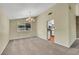 Dining room features carpet flooring and a chandelier at 3746 E Harmon Ave, Las Vegas, NV 89121