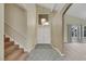 Inviting entryway with high ceilings and staircase at 3746 E Harmon Ave, Las Vegas, NV 89121