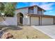 Two-story home with a two-car garage and gated entry at 3746 E Harmon Ave, Las Vegas, NV 89121