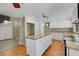 Updated kitchen offers an island, granite counters and stainless steel appliances at 3746 E Harmon Ave, Las Vegas, NV 89121