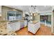 Bright kitchen features granite counters, an island, and stainless steel appliances at 3746 E Harmon Ave, Las Vegas, NV 89121