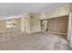 Open-concept living room featuring neutral paint and flooring at 3746 E Harmon Ave, Las Vegas, NV 89121