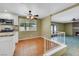 Bright living room with hardwood floors, brick fireplace, and lots of windows at 3746 E Harmon Ave, Las Vegas, NV 89121