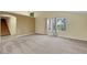 Open-concept living room with tile and carpet flooring at 3746 E Harmon Ave, Las Vegas, NV 89121