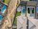 Overhead view highlighting a backyard pool, neat landscaping, and an outdoor lounge area, perfect for relaxation and entertainment at 389 Red Feather Peak Ct, Las Vegas, NV 89138