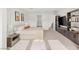 Bright bedroom features neutral tones, carpet, and a large built-in entertainment center at 389 Red Feather Peak Ct, Las Vegas, NV 89138