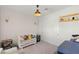 Cozy Bedroom with a crib, decorative wall art, and soft lighting at 389 Red Feather Peak Ct, Las Vegas, NV 89138