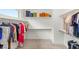 Walk-in closet with ample storage space and organized hanging racks and shelves at 389 Red Feather Peak Ct, Las Vegas, NV 89138
