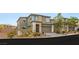 Stunning home with a two-car garage, landscaped front yard, and modern architecture at 389 Red Feather Peak Ct, Las Vegas, NV 89138