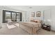 Serene primary bedroom with seating area, natural light, and ample space to create a relaxing retreat at 389 Red Feather Peak Ct, Las Vegas, NV 89138