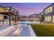 Gorgeous outdoor space with a pool, fire pit, and covered BBQ area, perfect for relaxation at 389 Red Feather Peak Ct, Las Vegas, NV 89138