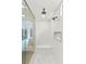 Stylish bathroom features a large walk-in shower with a built-in bench and modern fixtures at 389 Red Feather Peak Ct, Las Vegas, NV 89138