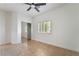 Bedroom with a ceiling fan, tile flooring, closet, and window with plantation shutters at 4014 Trapani Pl, Las Vegas, NV 89141