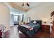 Large bedroom with hardwood floors, ample space, and modern ceiling fan at 43 E Agate Ave # 302, Las Vegas, NV 89123