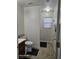 Clean bathroom featuring tiled floors and a walk-in shower at 5651 Bettors Luck Ct, Las Vegas, NV 89122