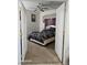 Comfortable bedroom featuring a ceiling fan and neutral decor at 5651 Bettors Luck Ct, Las Vegas, NV 89122