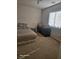 Bedroom with neutral walls and carpeted floor at 5651 Bettors Luck Ct, Las Vegas, NV 89122