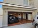 Spacious garage featuring an open door, with room for storage at 5651 Bettors Luck Ct, Las Vegas, NV 89122